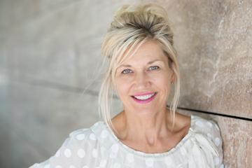 Woman posing posing outside of Bonita Grande Dental in 34135