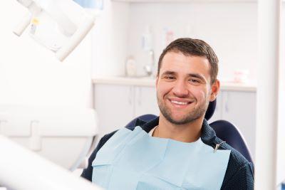 Man smiling while at the dentist in Bonita Springs, FL