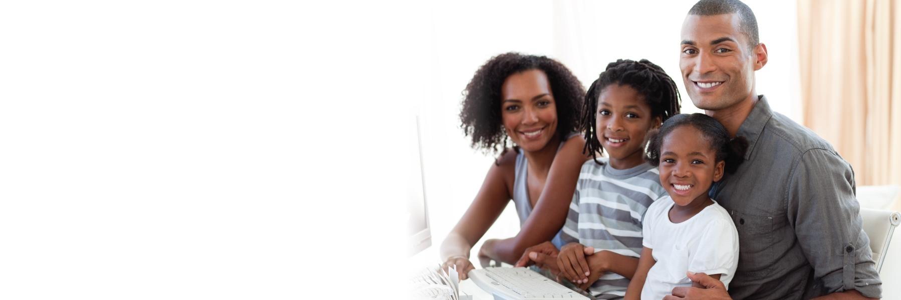 Family of dental patients smiling at 34135 dentist office