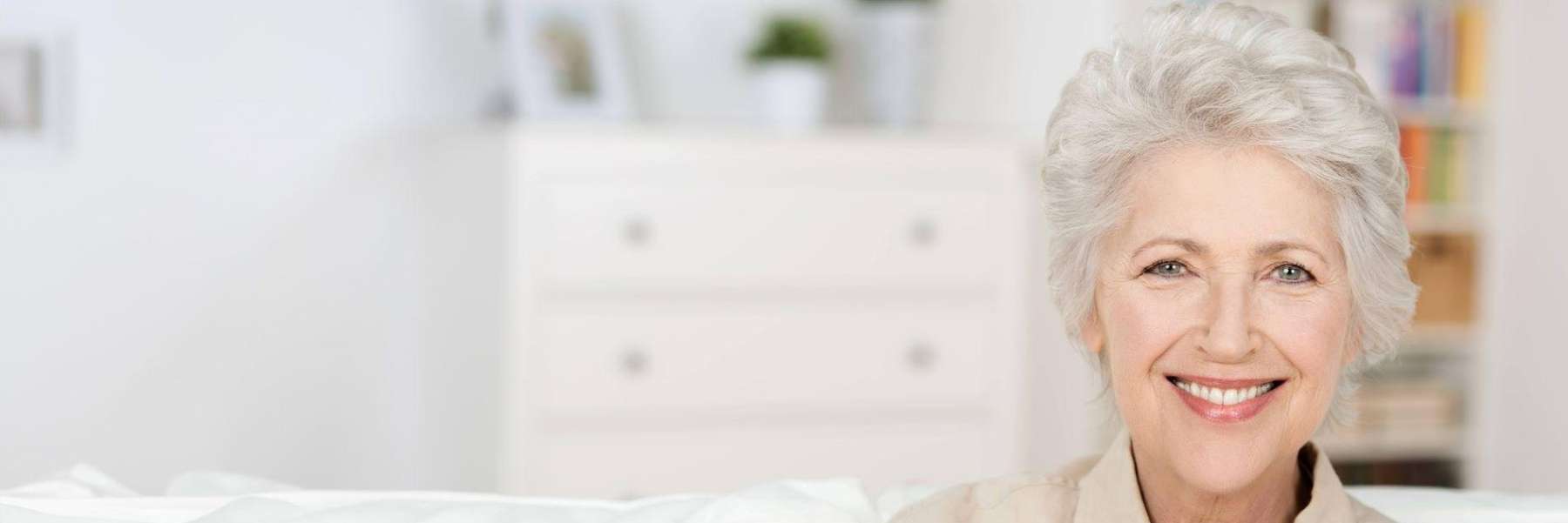 A woman with dental implants smiling in Bonita Springs.