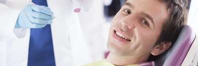 man during a dental exam in bonita springs fl